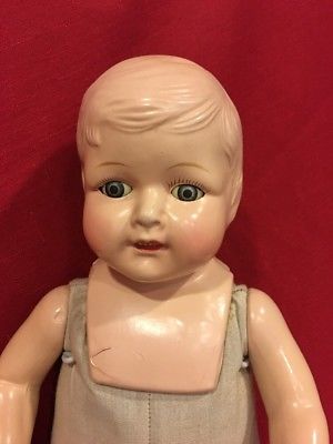 Boy doll with hole on top