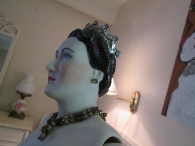 Doll side with jewels, earrings
