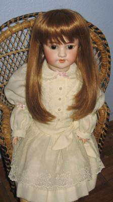 Pretty girl in Rattan chair