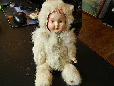 Real rabbit fur attached, wooden body and squeeks